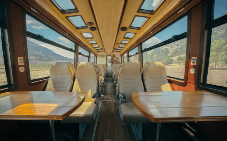 train with half-panoramic windows and white comfortable leather seats