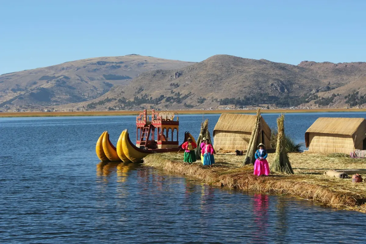Floating reef islands with locals on it Peru with Exploor Peru