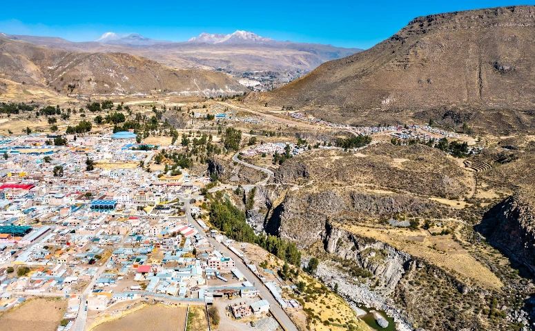 View on the buildings of the city chivay from the top Colca Canyon Peru with Exploor Peru