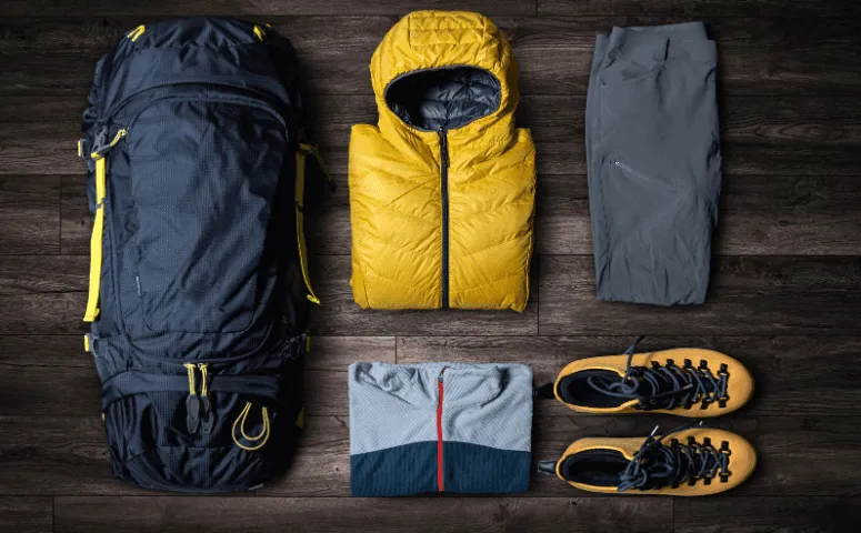 Travel equipment such as yellow jacket, hiking boots and more Machu Picchu Peru with Exploor Peru