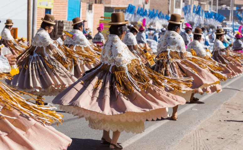 Local woman in colorful dresses Lake Titicaca Peru with Exploor Peru